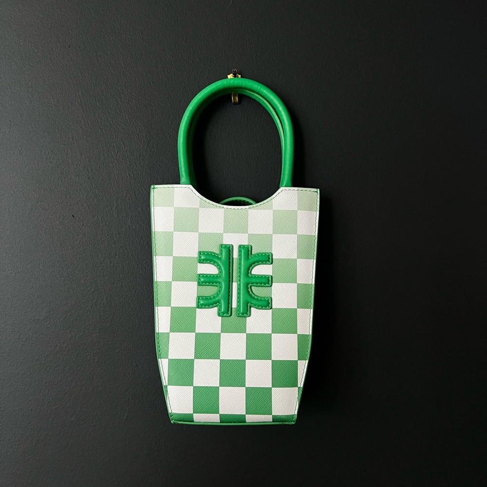 Green and white purse